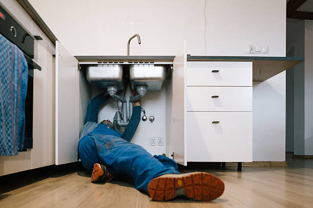 Professional Drain Cleaning technician working in West College Corner, IN